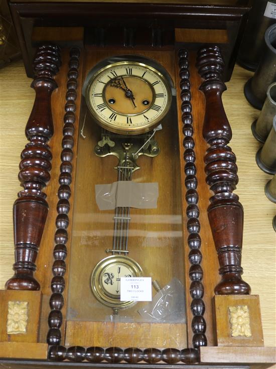 A wall clock and a mantel clock